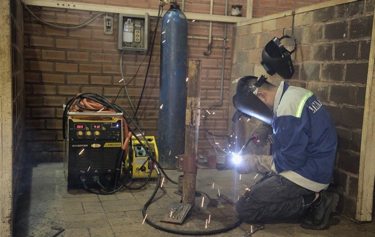Students of LILAMA2 International College practicing welding at the High-Tech Welding Training Center.